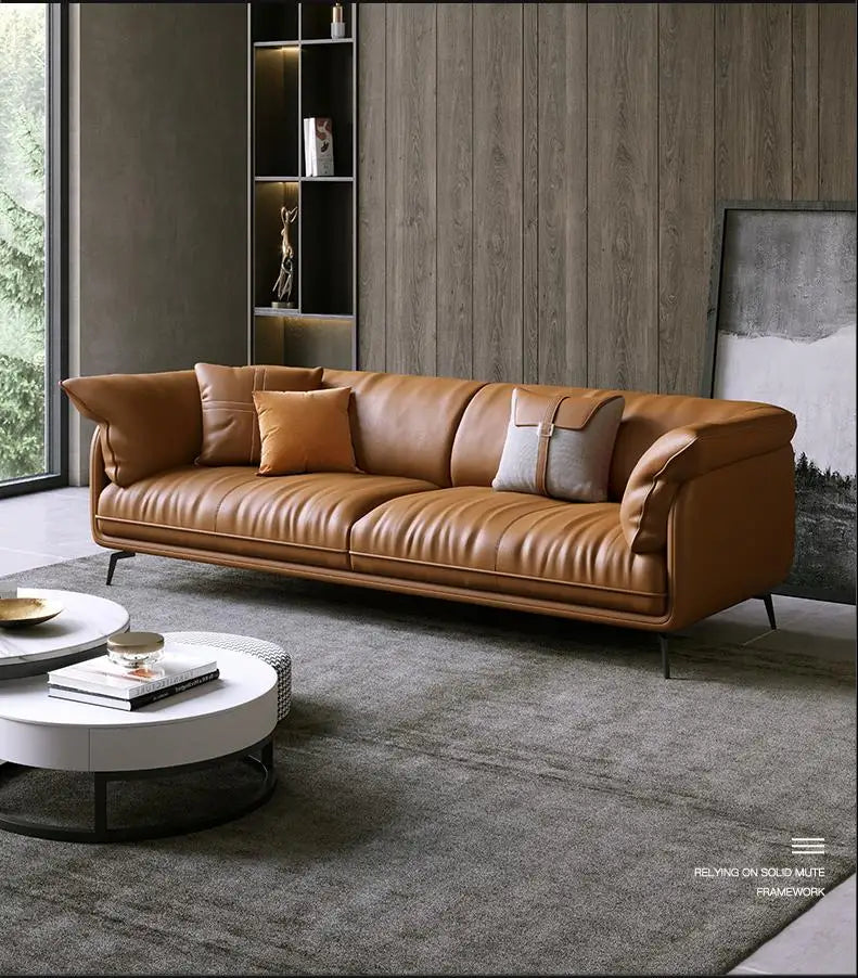 Curved Leather Sofa – Contemporary Upholstered Seating with Metal Legs