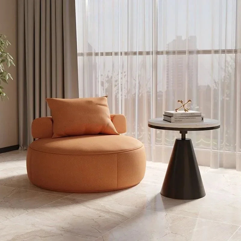 Round Lounge Chair – Sculptural Accent Seating with Bolster