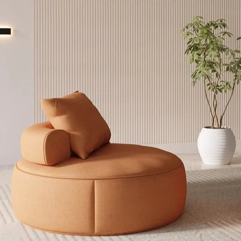 Round Lounge Chair – Sculptural Accent Seating with Bolster