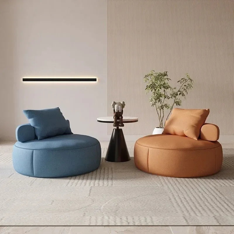 Round Lounge Chair – Sculptural Accent Seating with Bolster