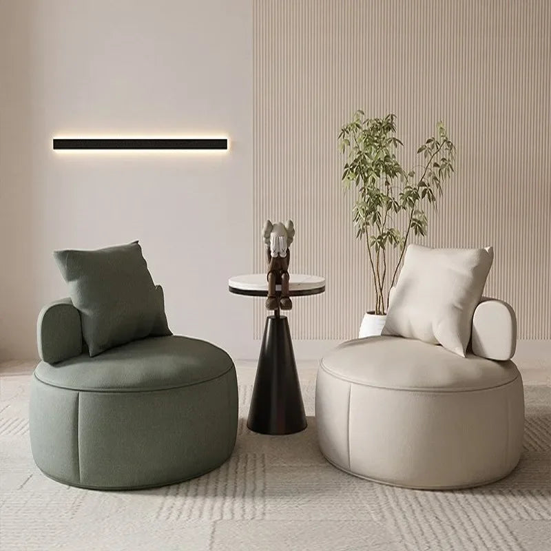 Round Lounge Chair – Sculptural Accent Seating with Bolster