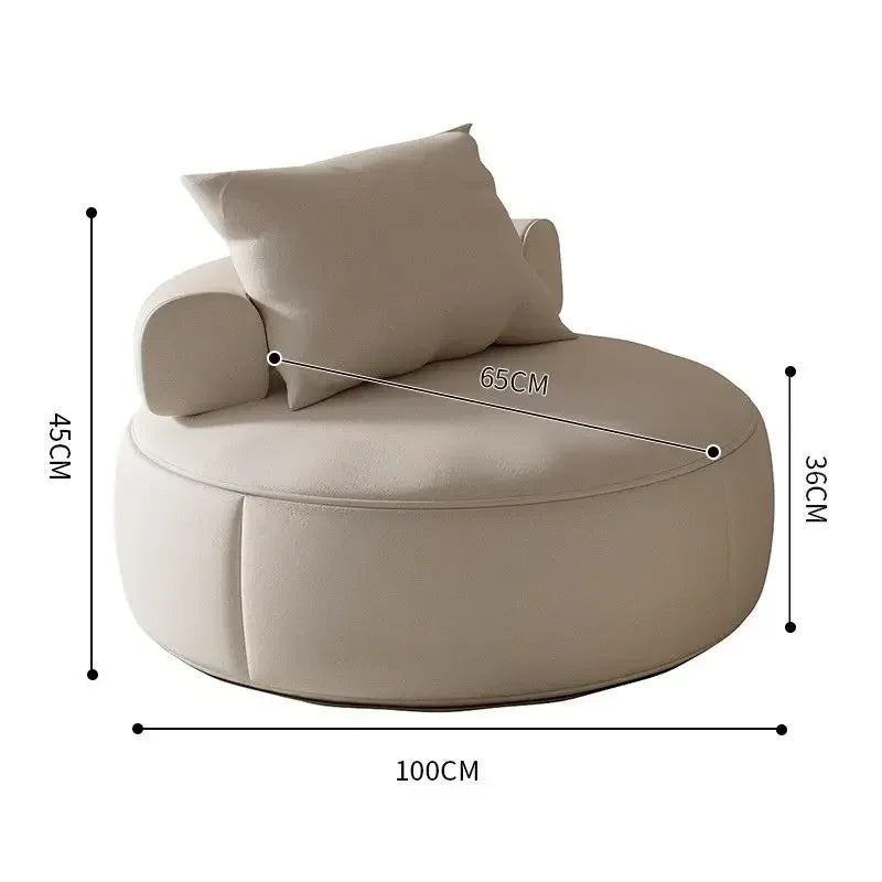 Round Lounge Chair – Sculptural Accent Seating with Bolster